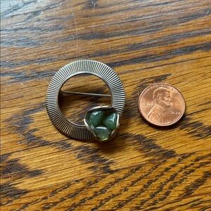 Elegant Silver and Green Brooch